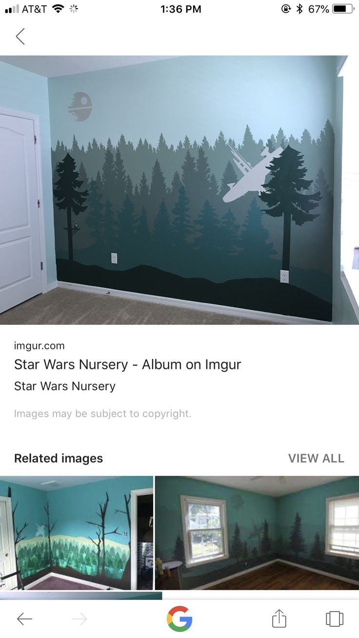 an image of a room with trees painted on the wall and other pictures below it