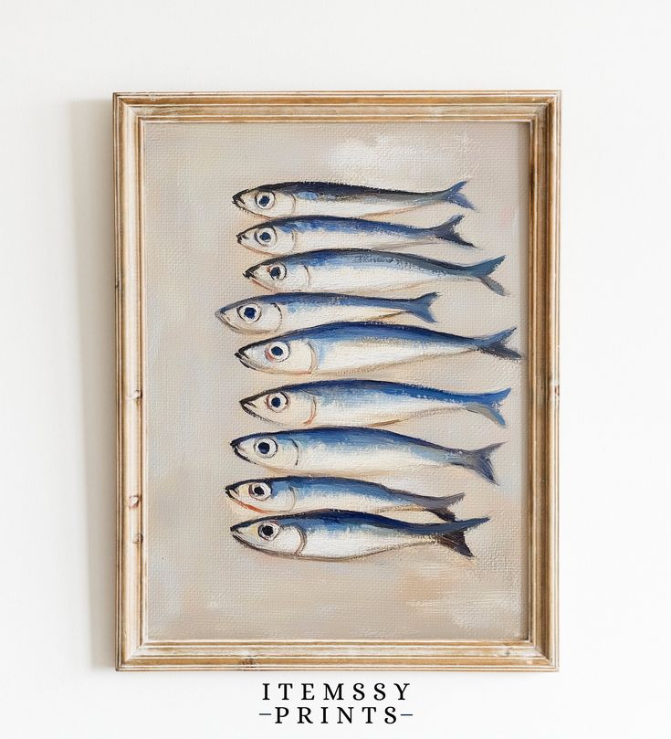 a painting of fish in a wooden frame on the wall above it is an inscription that reads intensity prints