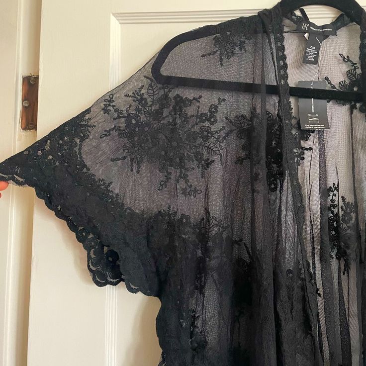 New With Tags, Black Lace Kimono From Inc. One Size Black Lace V-neck Sleepwear, Black Sheer V-neck Sleepwear, Black Lace Sleepwear For Loungewear, Black Lace Tops For Loungewear, Black Sheer Tops For Night, Black Lace Trim Sleepwear For Spring, Black Lace Tops For Daywear, Black Lace Summer Sleepwear, Black Lace Sleepwear