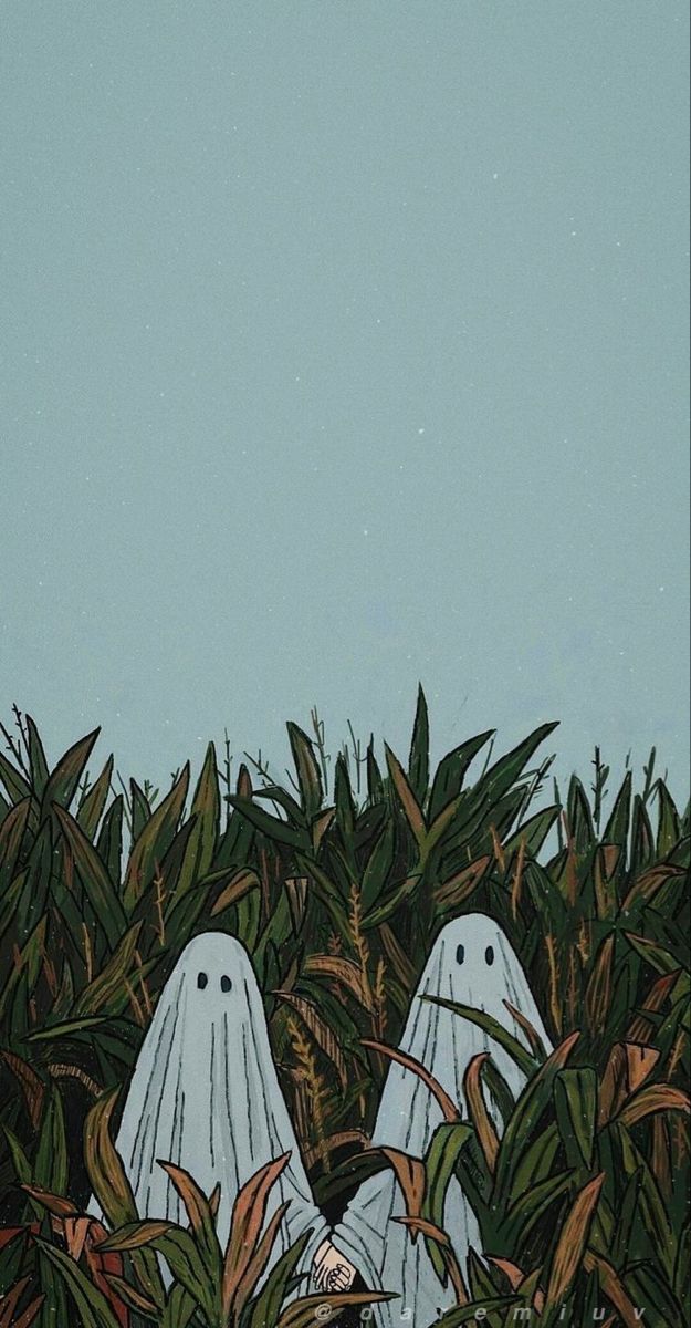 two white ghost like figures peeking out from the bushes