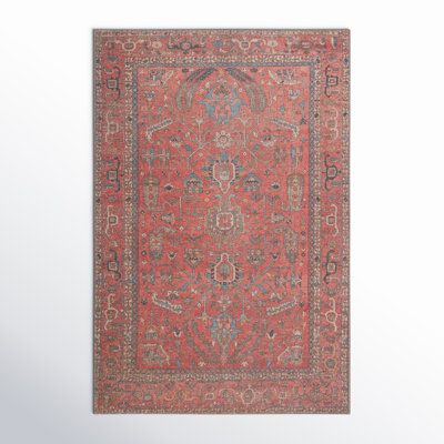 an antique persian rug is displayed against a white background