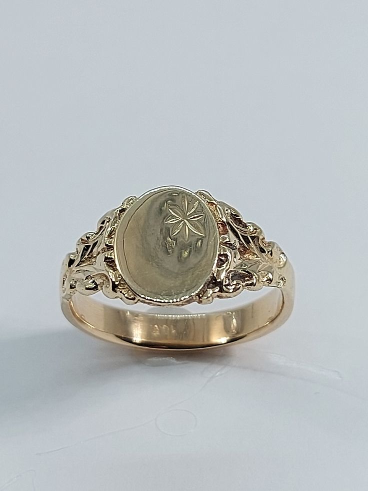 This classic signet ring has been carefully crafted from scratch in 10k solid Yellow Gold. Great for any occasion!  Buy it for your-self or buy it for the special person in your life! All of my jewelry is handmade from scratch and of high quality. This ring can be personalized with your initials upon request. Ring will be shipped  to you in an elegant gift box. A tracking shipping number will be provided to you once the ring has been mailed.   Ring Measurements and Materials: Ring Weight: 3.0 gr Signet Ring Women Gold, Luxury Yellow Gold Victorian Engraved Ring, Luxury Brown Elegant Signet Ring, Luxury Vintage Diamond Cut Signet Ring, Luxury Victorian Signet Ring As Gift, Matching Signet Rings, Luxury Antique Cameo Signet Ring, Men Signet Ring Gold, Signet Ring Engagement