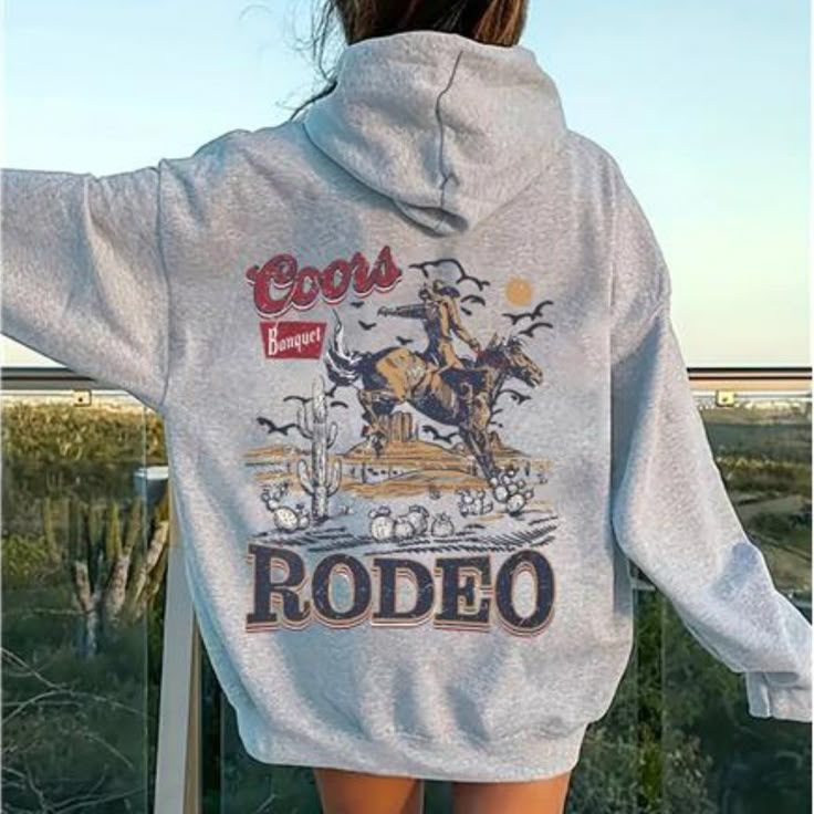 Channel Your Western Spirit With This Cowboy Print Long Sleeve Drawstring Pullover Hoodie. Featuring A Bold Cowboy Graphic, This Pullover Combines Comfort With Rustic Charm. The Adjustable Drawstring Ensures A Perfect Fit, While The Long Sleeves And Soft Fabric Keep You Cozy. Ideal For Casual Outings Or Lounging, This Hoodie Adds A Touch Of Cowboy Flair To Your Wardrobe, Making It A Standout Piece For Any Fan Of Western Style. Comfy Western Outfits, Western Hoodies, Cowboy Graphic, Cowboy Print, Southern Outfits, Country Sweatshirts, Cowboy Outfits, Kangaroo Pocket Hoodie, Pocket Hoodie