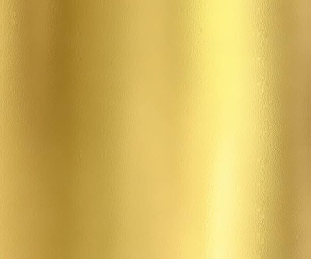 a close up view of a gold metallic background