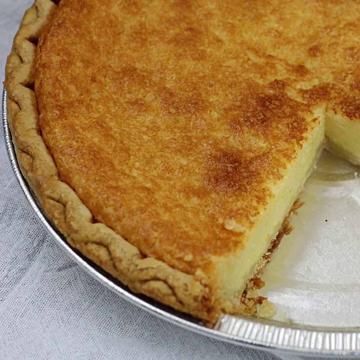 a pie sitting on top of a metal pan