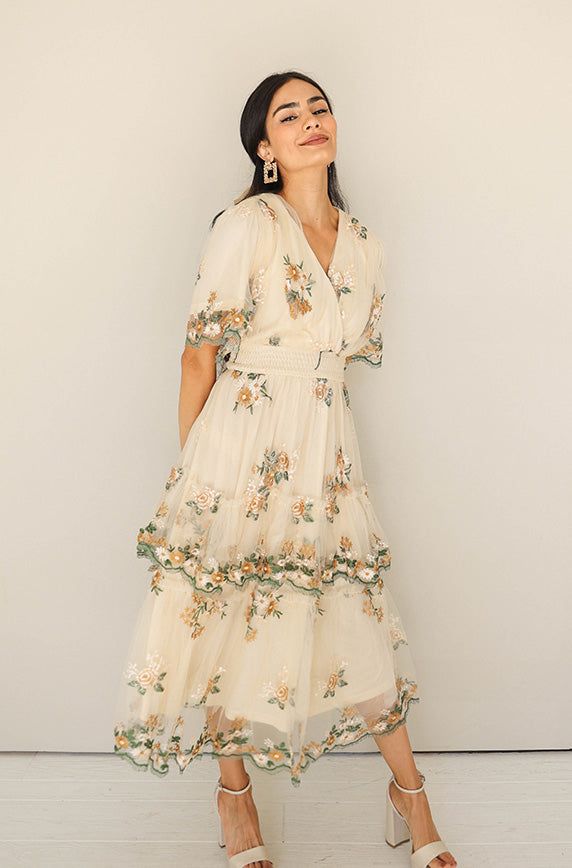 Eleanor Ivory Embroidered Tiered Dress- Restocked Garden Chic Wedding Attire Guest, Flowy Tiered Skirt Dress With Floral Embroidery, Dress For Anniversary, Embroidered Dress Designs, Wedding Guest Floral Dress, Tiered Dress With Floral Embroidery, Ivory Dress Outfit, Cottagecore Beige Dress With Floral Embroidery, Tea Dress Outfit