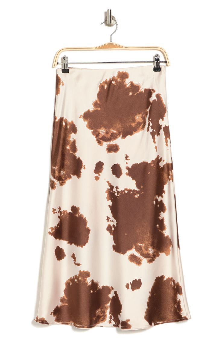 Get ready for your next festival with this trendy cow print midi skirt that features a satin construction. Fixed waist Cowl print Satin construction Midi length Machine wash cold Imported Model stats: 5'10", 32" bust, 25" waist, 36" hip. Model is wearing size S. Cow Print Skirt, Cow Prints, Cow Outfits, Spring Capsule Wardrobe, Light Spring, Printed Midi Skirt, Midi Length Skirts, Color Analysis, Warm Autumn