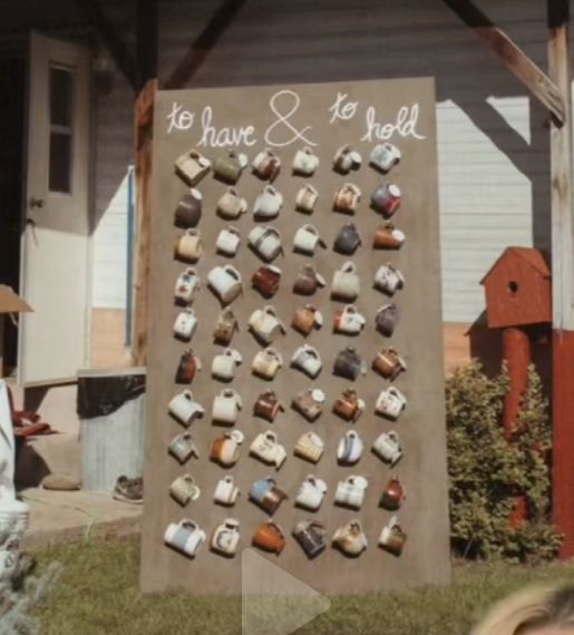 a sign that says to have and to sell with cupcakes on it in front of a house