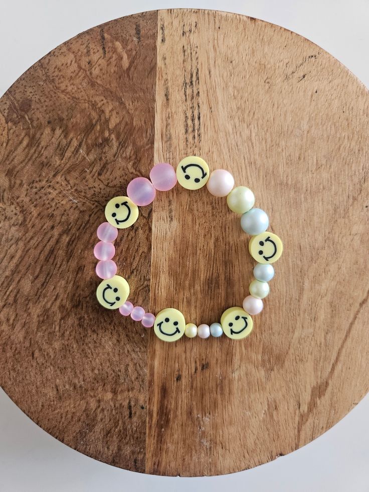 Happy smiley face bead bracelet, double sided beads and stretchy Pictured with Matte Gummy Bear Bracelet sold separate Trendy Cheap Stretch Bracelet With Smiley Face, Smiley Face Bracelet, Kids Bead Bracelet, Bear Bracelet, Happy Smiley Face, Smiley Faces, Gummy Bear, Stretchy Bracelets, Gummy Bears