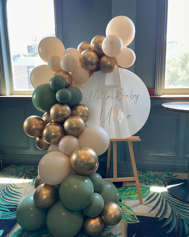 a bunch of balloons that are on top of a table