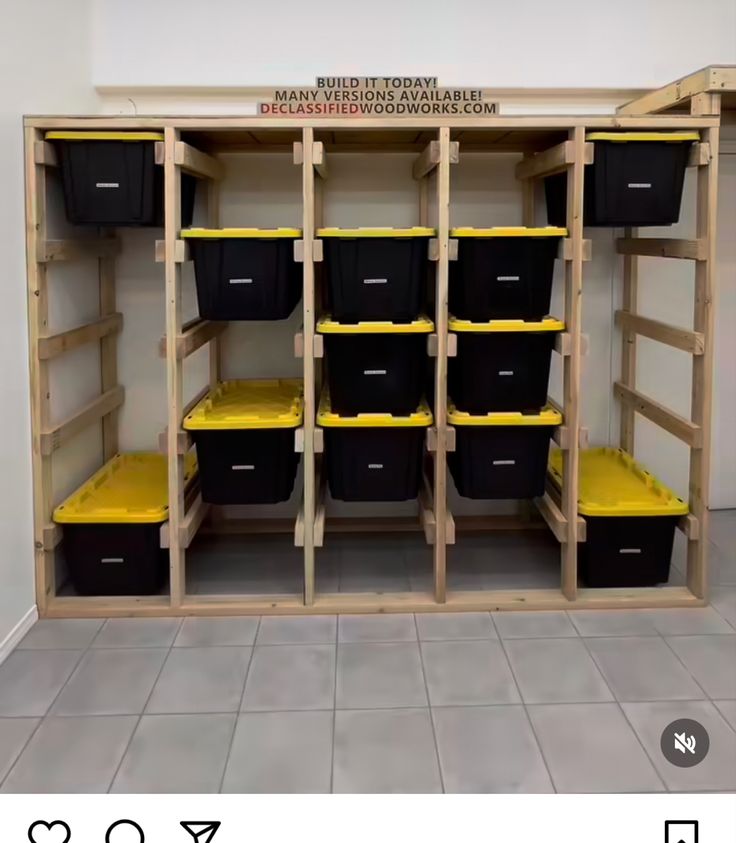 the shelves are filled with black and yellow bins