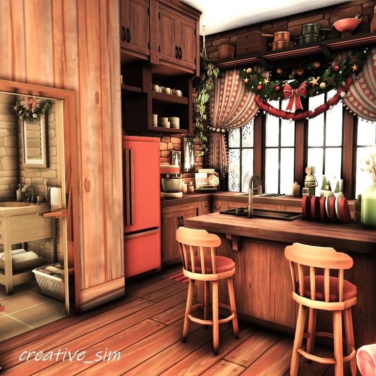 the kitchen is decorated for christmas and has wooden floors