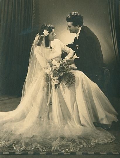 an old black and white photo of a bride and groom