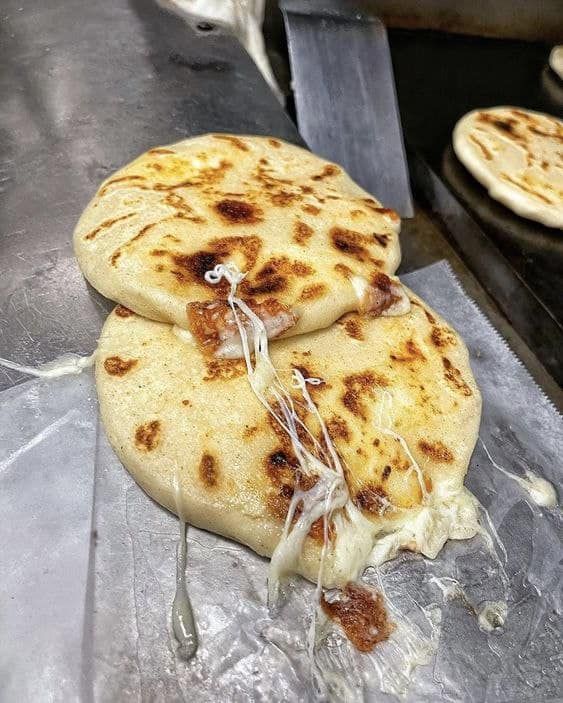 three flat breads sitting on top of a piece of tin foil