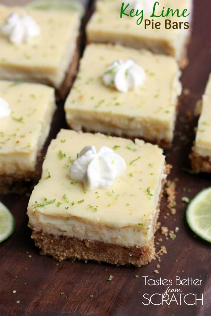 key lime pie bars on a wooden cutting board