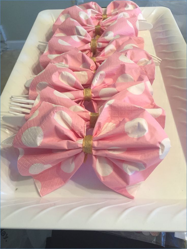 pink and white polka dot bows on a plate