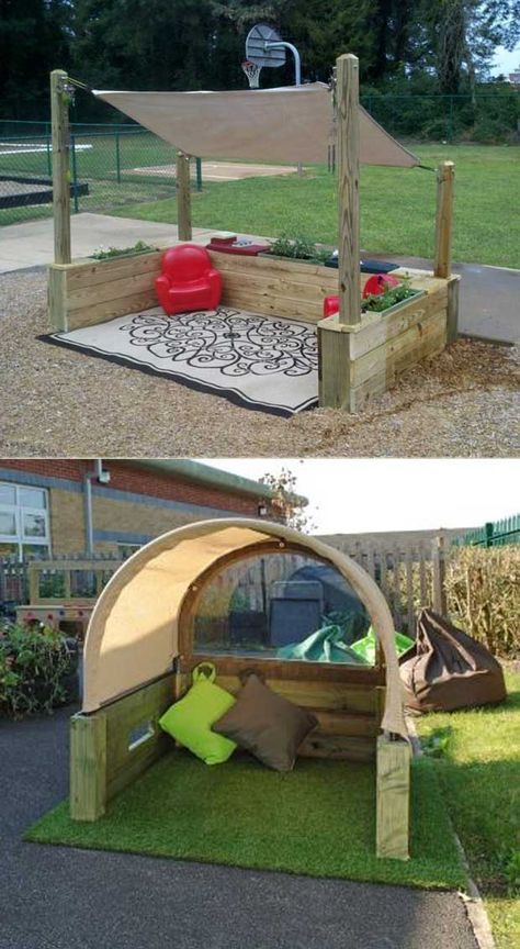 an outdoor play area made out of wooden pallets and grass with a hammock attached to it