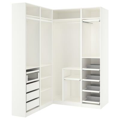 an open white closet with shelves and drawers on the bottom shelf, in front of a white background