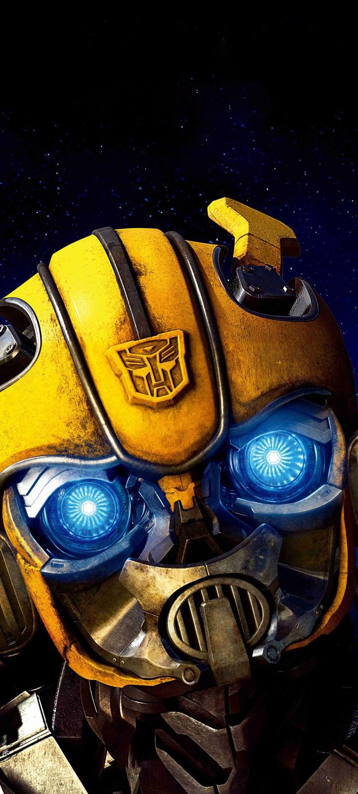 a yellow and black robot with blue eyes