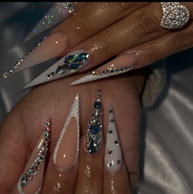 Blinged Almond Nails, Stiletto Nail Inspo Baddie, Nail Designs With Rhinestones Bling, Stilleto Nails Designs Rhinestones, Stiletto Nails With Rhinestones, Unique Nail Designs Classy, Diamond Stilleto Nails, Stilleto Christmas Nails Long, Stilleto Nails Long Designs