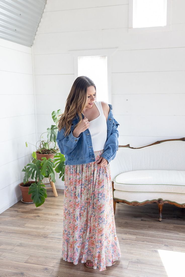 Look no further, our best-selling maxi skirt is here in a fresh new print! The stunning bright floral print, flattering button detail, and a flowy maxi-length is sure to make this your go-to for any summer get-together! Whether you’re heading out on a flirty date night or a daytime gathering, the only thing you’ll be worried about is having too much fun! Features: smocked elastic waist, functional buttons, lined to knee, floral print, open in front, long length Color: Blush Mix100% RayonFor full care instructions, please refer to the manufacturer's label. Fit: True to size.Length: Hits at the ankle on most -- 42” in total lengthWaist: Stretchy with elastic waistbandHips: Relaxed with give Models are wearing size Medium and Small respectively. MODEL INFO Ashley Brook Height: 5'3" Height: 5' Casual Non-stretch Floral Maxi Skirt, Bohemian Pink Floral Print Maxi Skirt, Spring Bohemian Floor-length Maxi Skirt, Non-stretch Bohemian Maxi Skirt, Non-stretch Floral Print Beach Skirt, Floral Maxi Skirt, Floral Maxi, Long Length, New Print