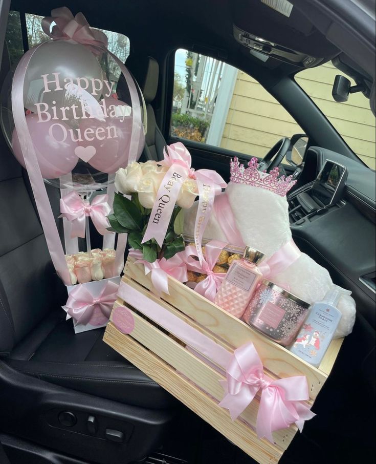 a car filled with lots of pink and white items