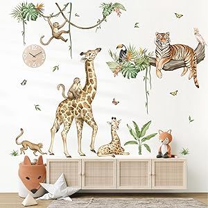 an animal themed wall sticker in a children's room with various animals and plants