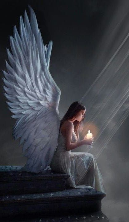 an angel holding a candle sitting on some steps