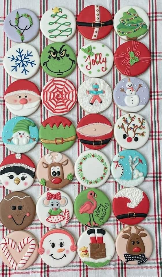 christmas themed cookies are arranged on a checkered tablecloth