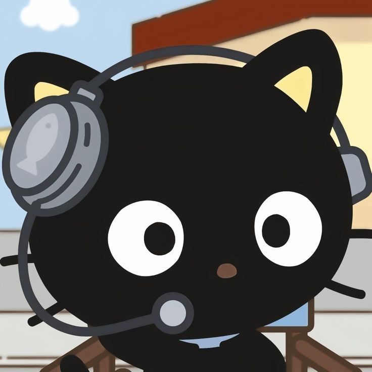 a black cat with headphones on its ears