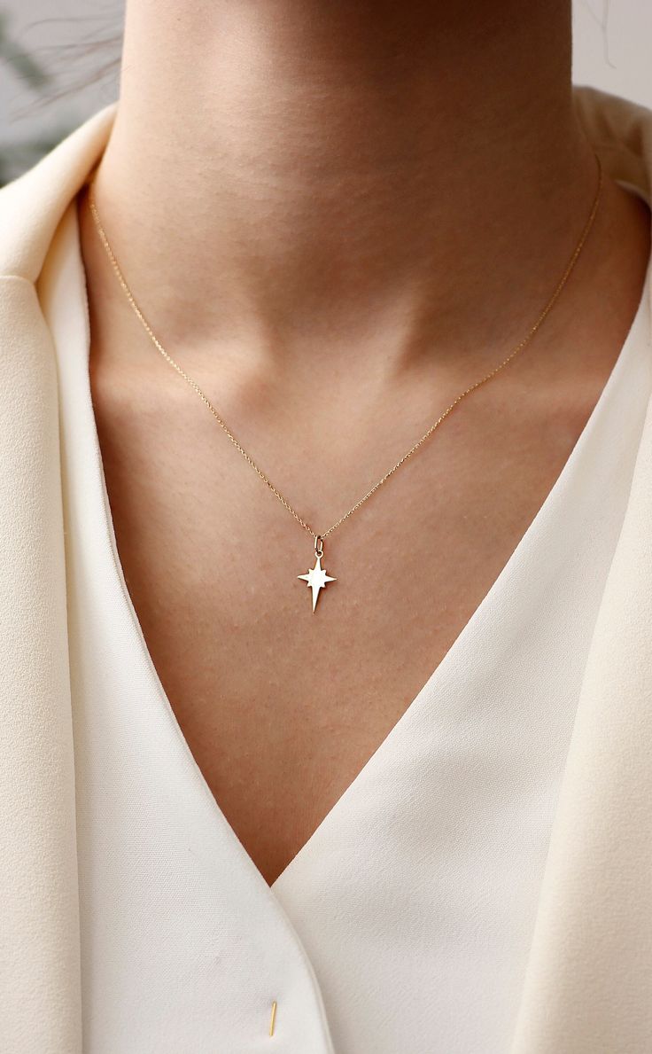 14K Gold Northern Star Necklace, North Star Necklace, Pole Star Necklace, Dainty Necklace About Product: * Every package comes with unique charm as a gift. * Chain is made of 100% 14K Solid Gold. * The package includes product certificate. * Every package comes in a special gift box. * Available in different chain lengths. * The product color is golden yellow. PRODUCTION: We are jewelry artisans and manufacturers. Every Jewelry is made from the very scratch, and made by hand and carefully polish Northern Star, North Star Necklace, Pole Star, Necklace Dainty, North Star, Dainty Necklace, Golden Yellow, Star Necklace, Unique Charms