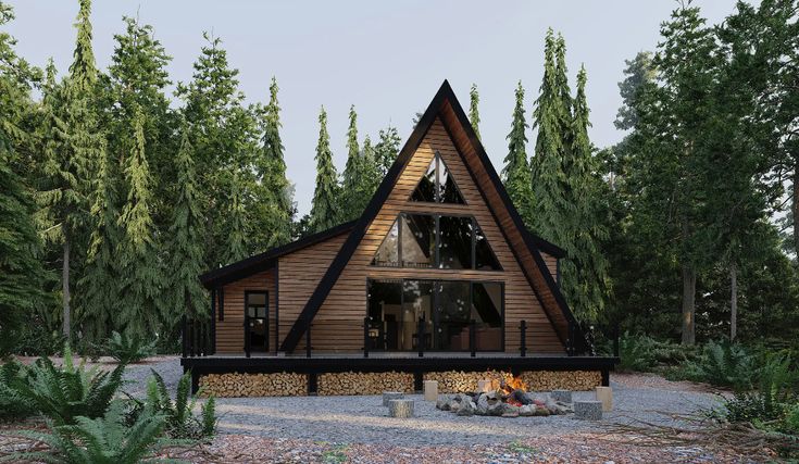 a - frame cabin in the woods with fire pit and picnic table on gravel area