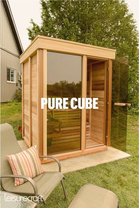 an outdoor sauna with the words pure cube on it