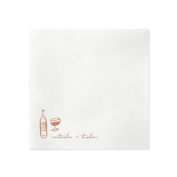 a white napkin with an orange wine bottle and glass on the front, in red ink