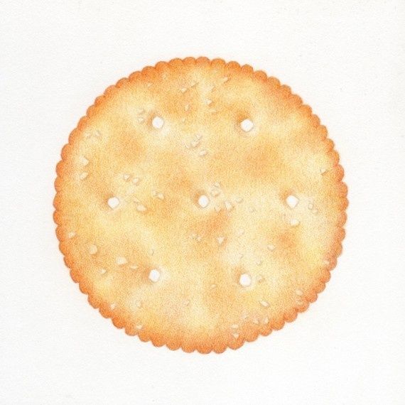 an image of a cookie on a white paper background that looks like it has been baked