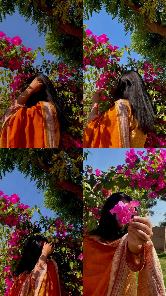 the woman is wearing an orange dress and holding a pink flower in her left hand