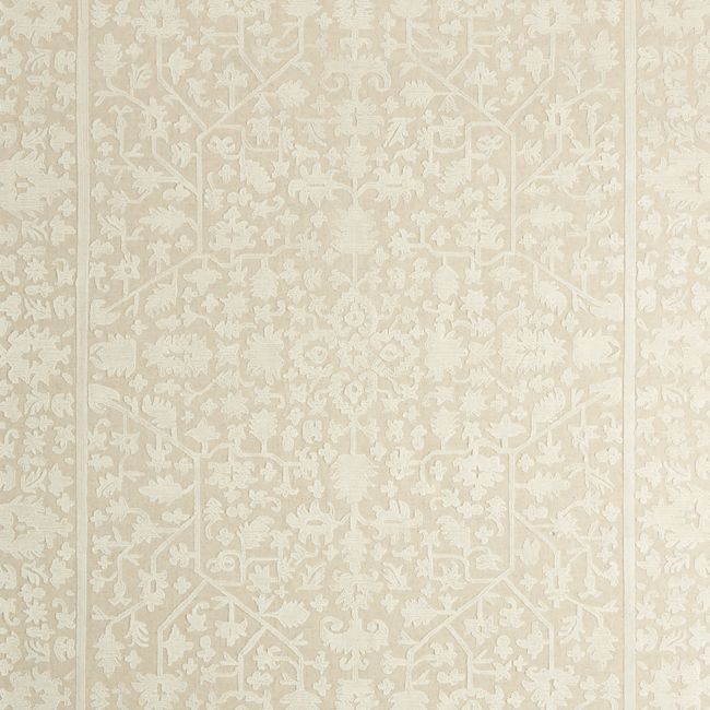 a white wallpaper with an intricate design on it