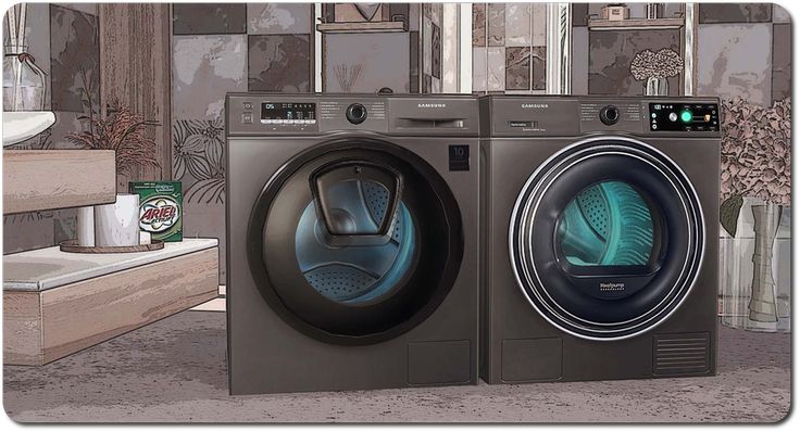 two washing machines sitting next to each other in front of a washer and dryer