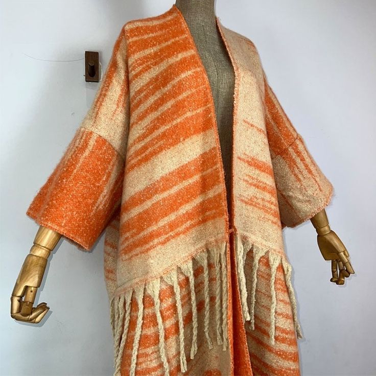 This super soft and warm wool cardigan kimono is perfect for the cold weather. Unlike other sweaters and wools, the wool used for this beauty is non itchy. Think of your favorite throw blanket, the comfort and warmth it gives but 10x stylish and wearable any where. This kimono is all that and more! One size fits S-4X Material: Wool One Size Fits Most Size Chart One Size Cozy Open Front Cardigan, Cozy Open Front Cardigan One Size, Cozy One Size Open Front Cardigan, One Size Long Sweater For Fall, Cozy Open Front Sweater One Size, One Size Acrylic Outerwear For Layering, Cozy Acrylic Sweater Coat For Fall, Fall Cashmere Shawl, Cozy Open Front One-size Sweater