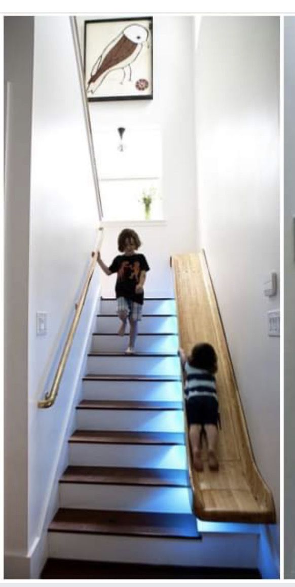 two children are walking up and down the stairs