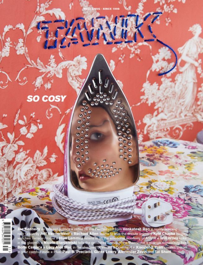 a magazine cover with an image of a woman's face in a ironing board