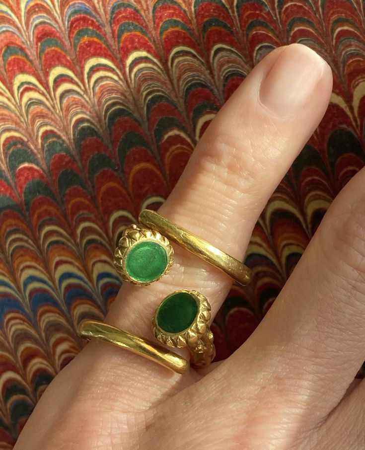 The nail is an enduring symbol of strength and also one of unity, as the function of a nail is to unite two objects. ✨ This fun stylized nail ring gracefully encircles the finger in 18k yellow gold with green enamel accents. Signed Gioconda. Two available Weight: 9.1 grams Size: 4 Unique Gold Emerald Cabochon Ring, Silver Money Clip, Dog Brooch, Nail Ring, Green Enamel, Black Enamel, Diamond Solitaire, Crystal Necklace, Statement Rings