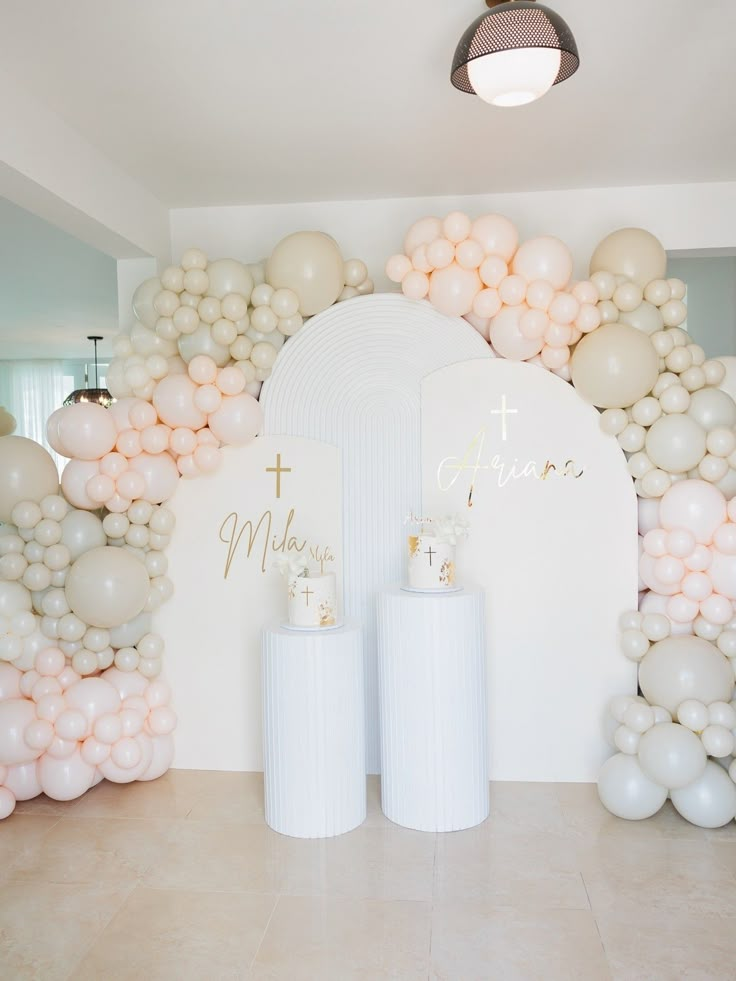 a room filled with balloons and decorations on the wall