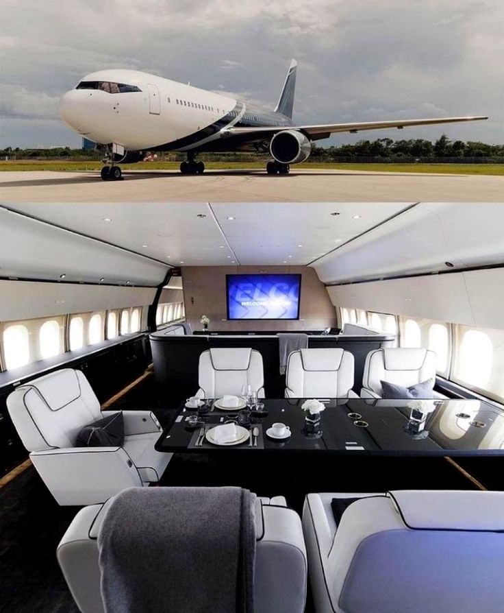 the inside of an airplane with tables and chairs in front of it, and another plane on the tarmac