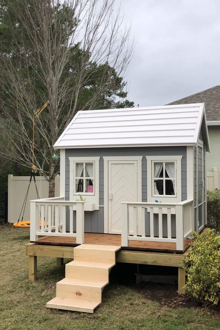 Wooden Playhouse in custom colour in a backyard by WholeWoodPlayhouses Playhouse Decorating Ideas Interior, Playhouse Ideas Outdoor, Playhouse Decorating Ideas, Kids Playhouse Interior, Playhouse Interior Ideas, Kids Playhouse Ideas, Kids Wooden Playhouse, Playhouses For Kids, Outdoor Playhouse Plans