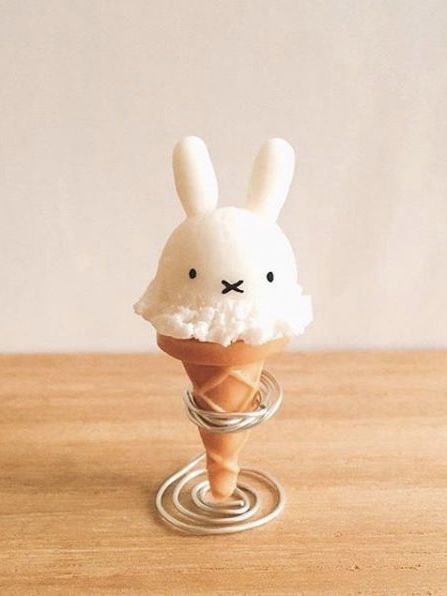 an ice cream cone with a bunny face on it