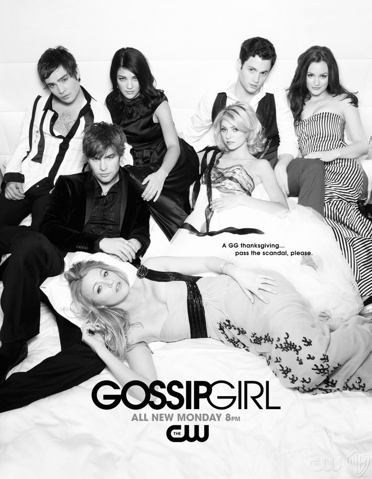 the cast of gossipgirl lying on a bed