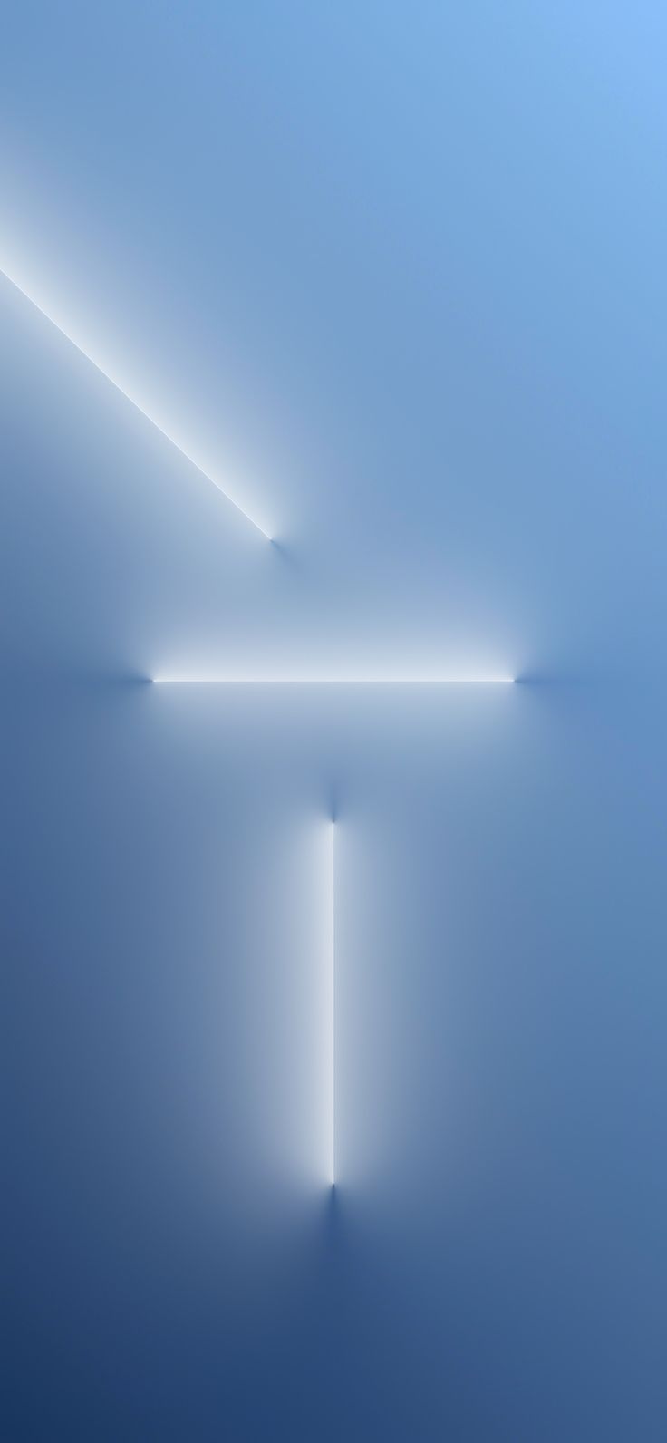 an abstract photo with white light coming from the ceiling and blue wall to the floor