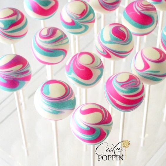 there are many cake pops on the stick