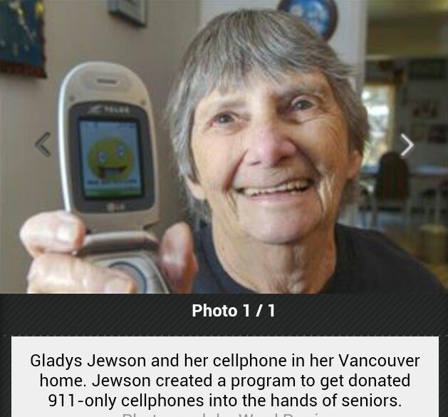 an older woman holding up her cell phone to take a selfie with the caption